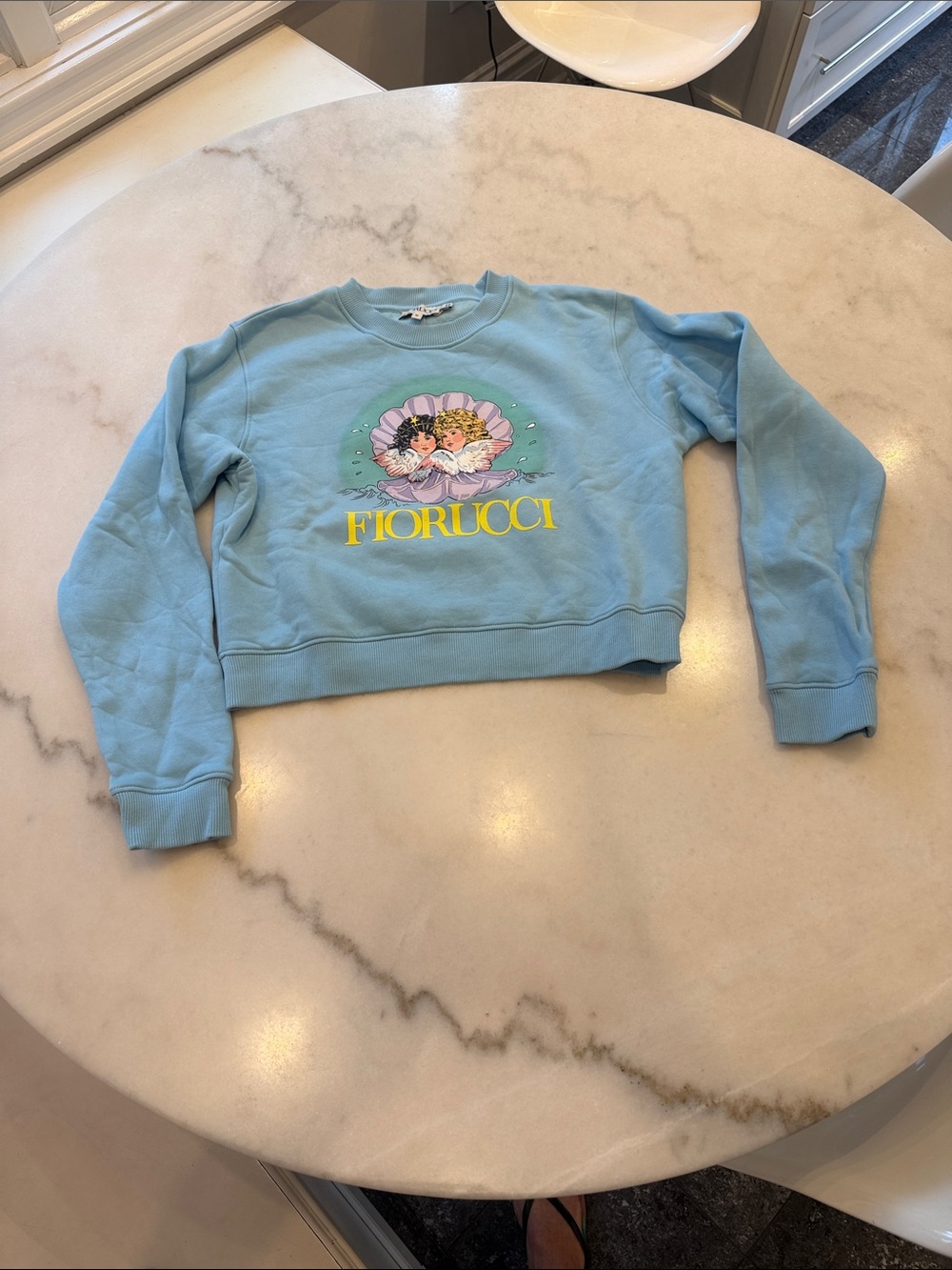 Fiorucci Sky Blue Cropped Graphic Sweatshirt with Cherub Logo